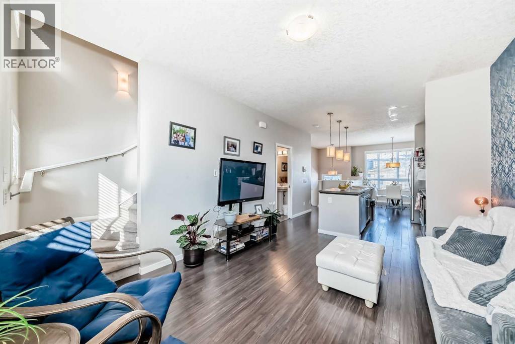 656 Copperpond Boulevard Se, Calgary, AB - Indoor Photo Showing Living Room