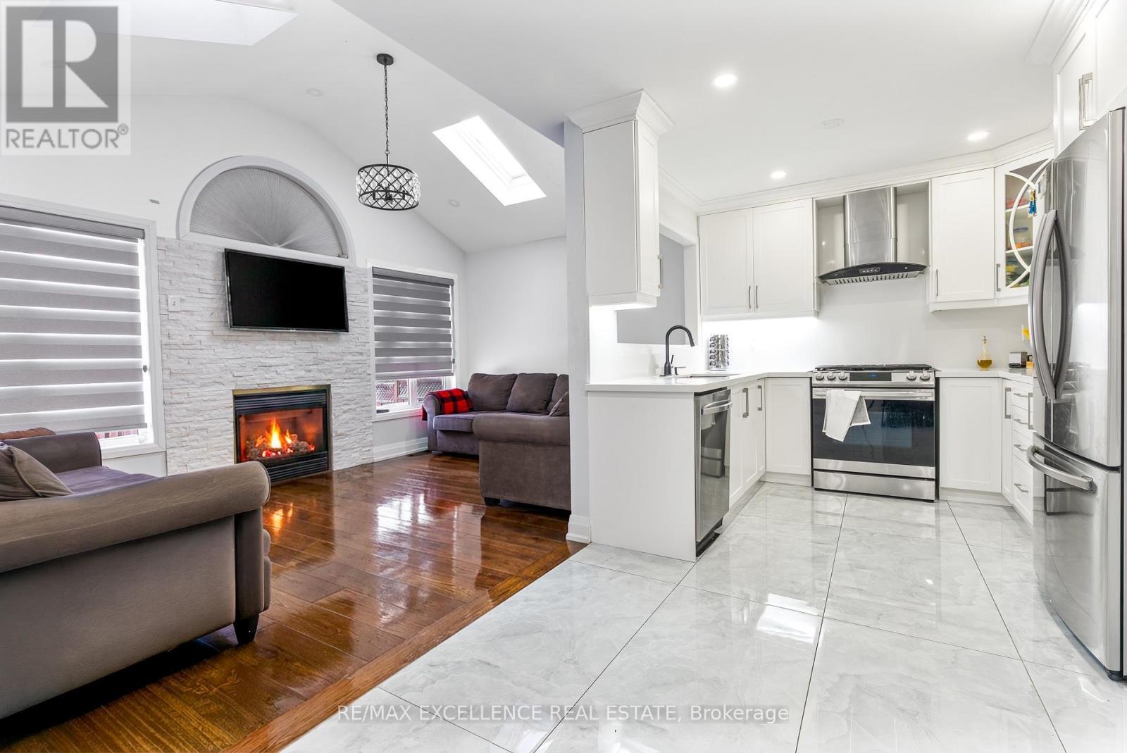 159 Cordgrass Crescent, Brampton, ON - Indoor Photo Showing Kitchen With Fireplace