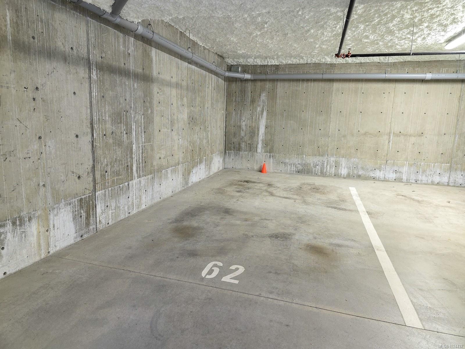 204-6544 Metral Dr, Nanaimo, BC - Indoor Photo Showing Garage