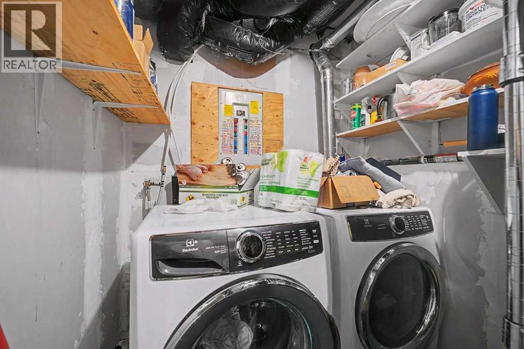 267 Panamount Hill Nw, Calgary, AB - Indoor Photo Showing Laundry Room