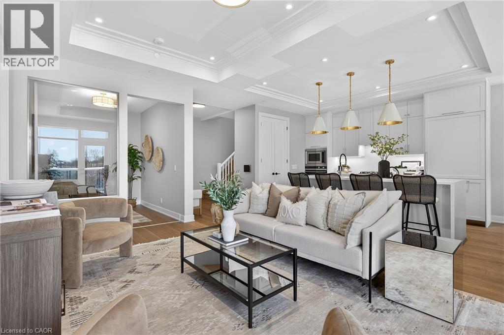 Freshly painted in Nov 2025 - 123 Maurice Drive Unit# 401, Oakville, ON - Indoor Photo Showing Living Room