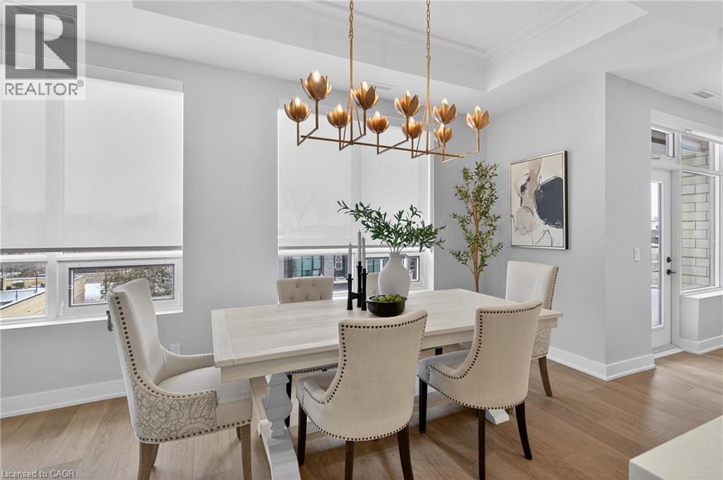 NEW Visual Comfort & Co gold leaf light fixture - 123 Maurice Drive Unit# 401, Oakville, ON - Indoor Photo Showing Dining Room