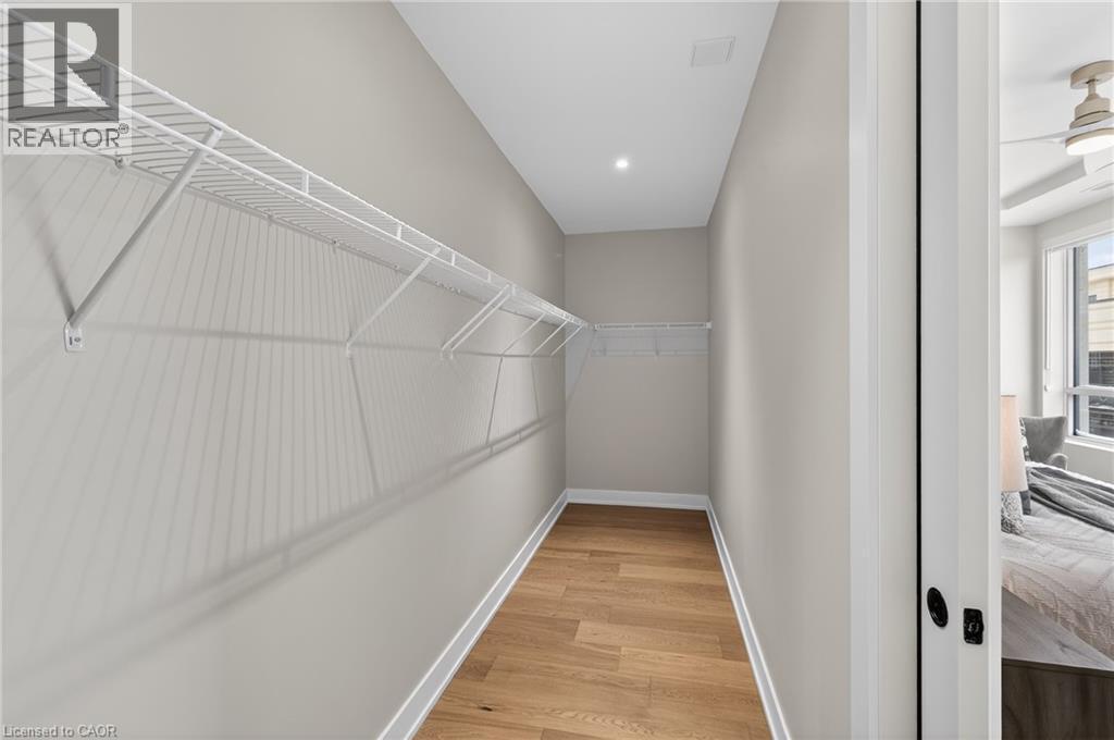 Full walk-in closet - 123 Maurice Drive Unit# 401, Oakville, ON - Indoor