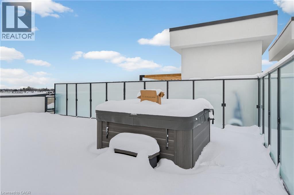 Wellness Co. 6-seater 10x10 hot tub w/ speakers - 123 Maurice Drive Unit# 401, Oakville, ON - Outdoor With Exterior