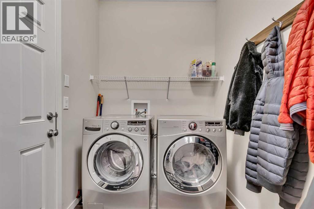1544 Panatella Boulevard Nw, Calgary, AB - Indoor Photo Showing Laundry Room