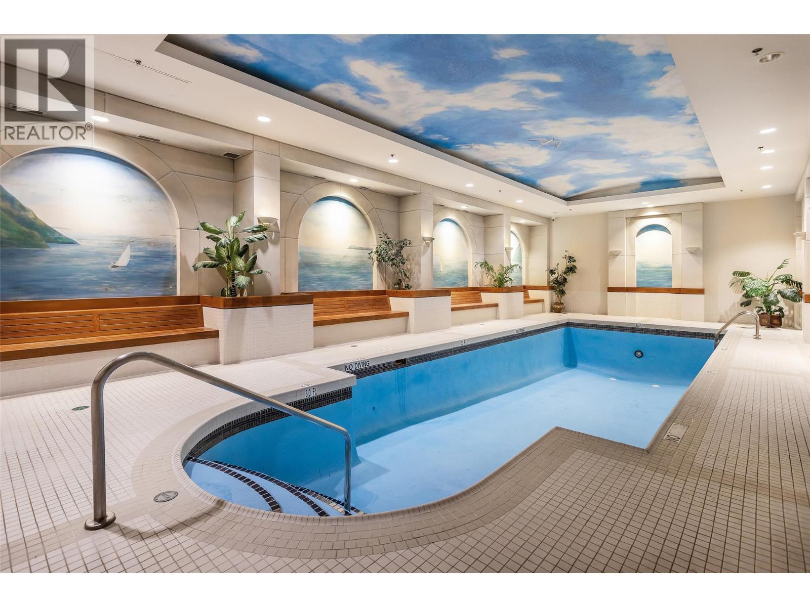 1152 Sunset Drive Unit# 1601, Kelowna, BC - Indoor Photo Showing Other Room With In Ground Pool