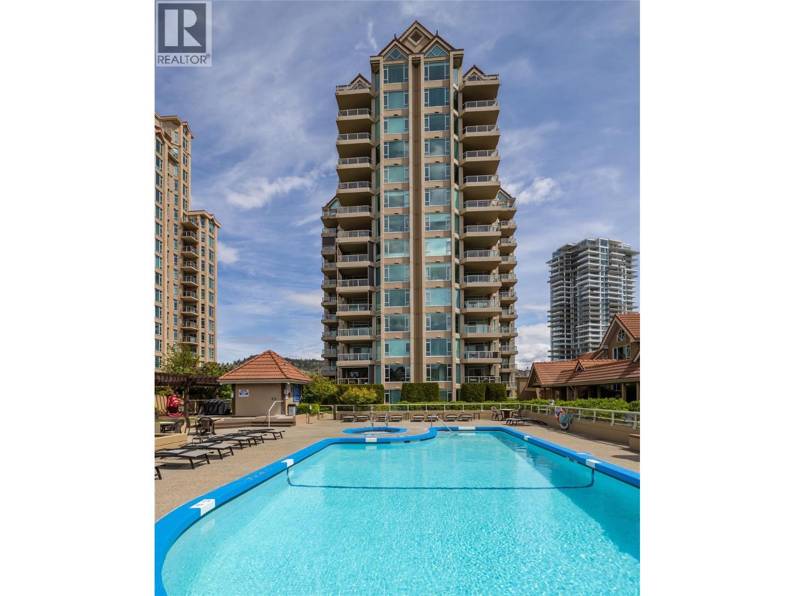 1152 Sunset Drive Unit# 1601, Kelowna, BC - Outdoor With In Ground Pool With Facade