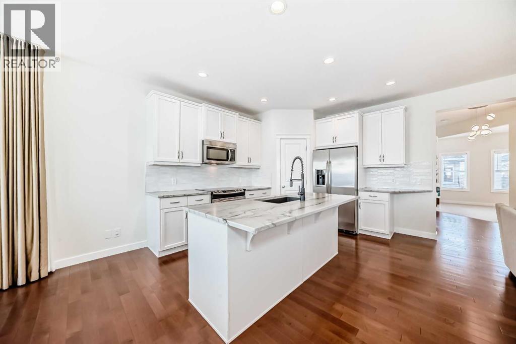 105 Elgin Meadows Circle Se, Calgary, AB - Indoor Photo Showing Kitchen With Upgraded Kitchen