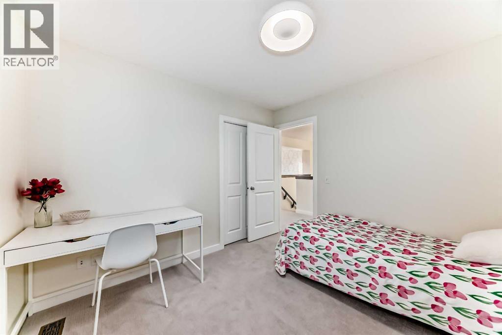 105 Elgin Meadows Circle Se, Calgary, AB - Indoor Photo Showing Bedroom