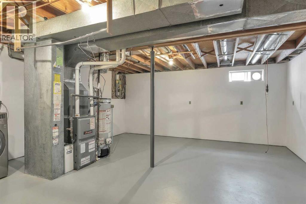 218 Pinemeadow Road Ne, Calgary, AB - Indoor Photo Showing Basement