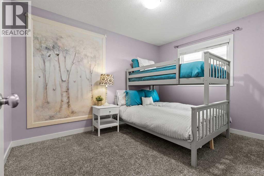 Bedroom 3 - 69 Ravenskirk Close Se, Airdrie, AB - Indoor Photo Showing Bedroom