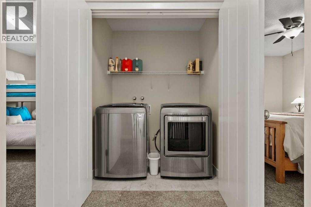 Upper level laundry - 69 Ravenskirk Close Se, Airdrie, AB - Indoor Photo Showing Laundry Room