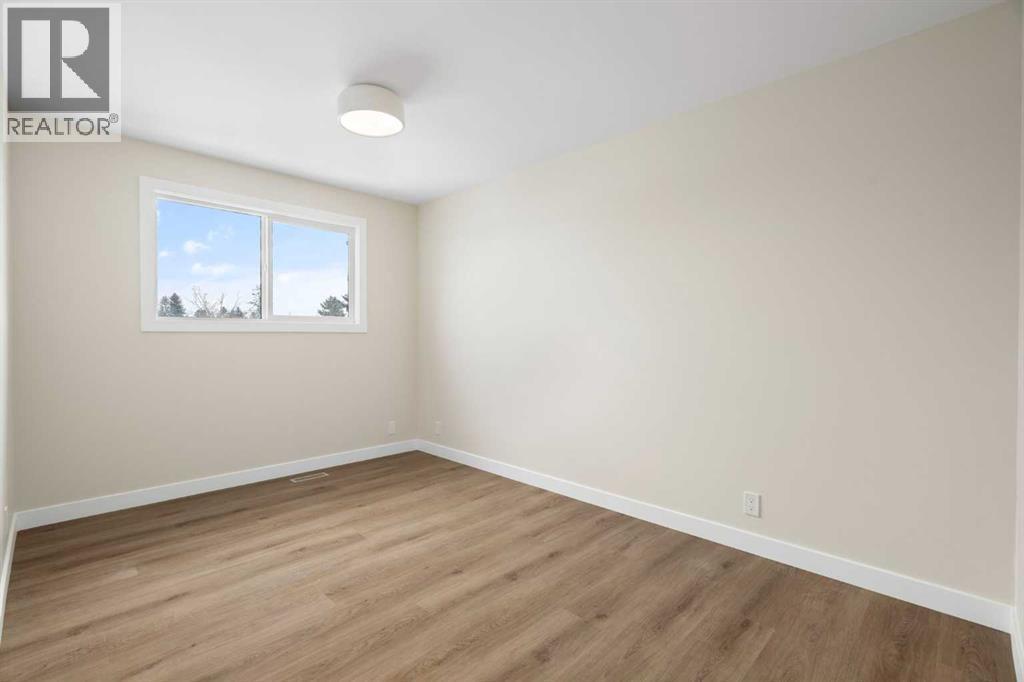 Upstairs Bedroom 1 - 248 Madeira Place Ne, Calgary, AB - Indoor Photo Showing Other Room