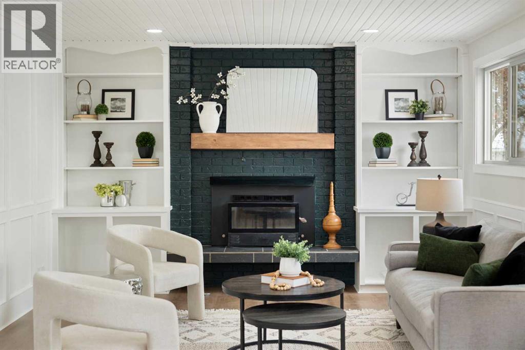 Family Room - 248 Madeira Place Ne, Calgary, AB - Indoor Photo Showing Living Room With Fireplace