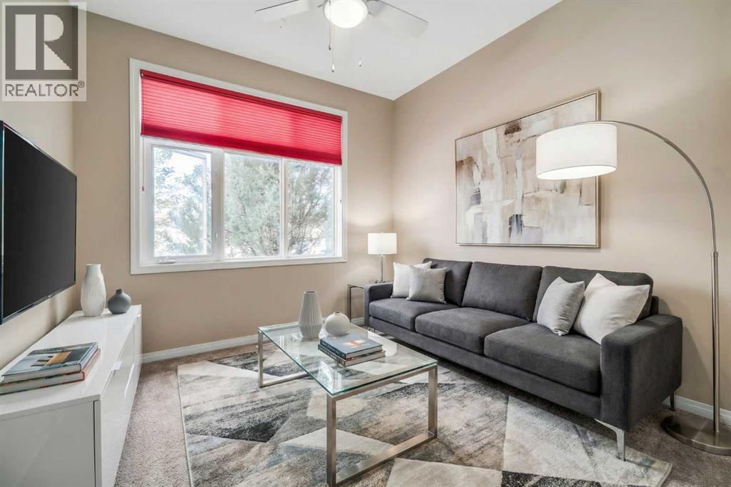 1113, 1113 Lake Fraser Green Se, Calgary, AB - Indoor Photo Showing Living Room