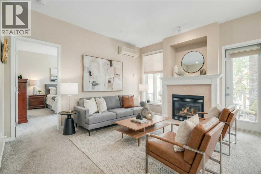 1113, 1113 Lake Fraser Green Se, Calgary, AB - Indoor Photo Showing Living Room With Fireplace