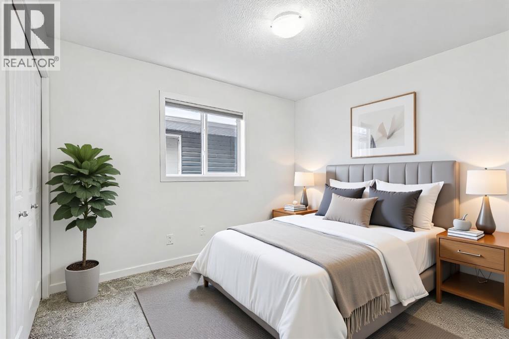 1124 Chinook Gate Bay Sw, Airdrie, AB - Indoor Photo Showing Bedroom