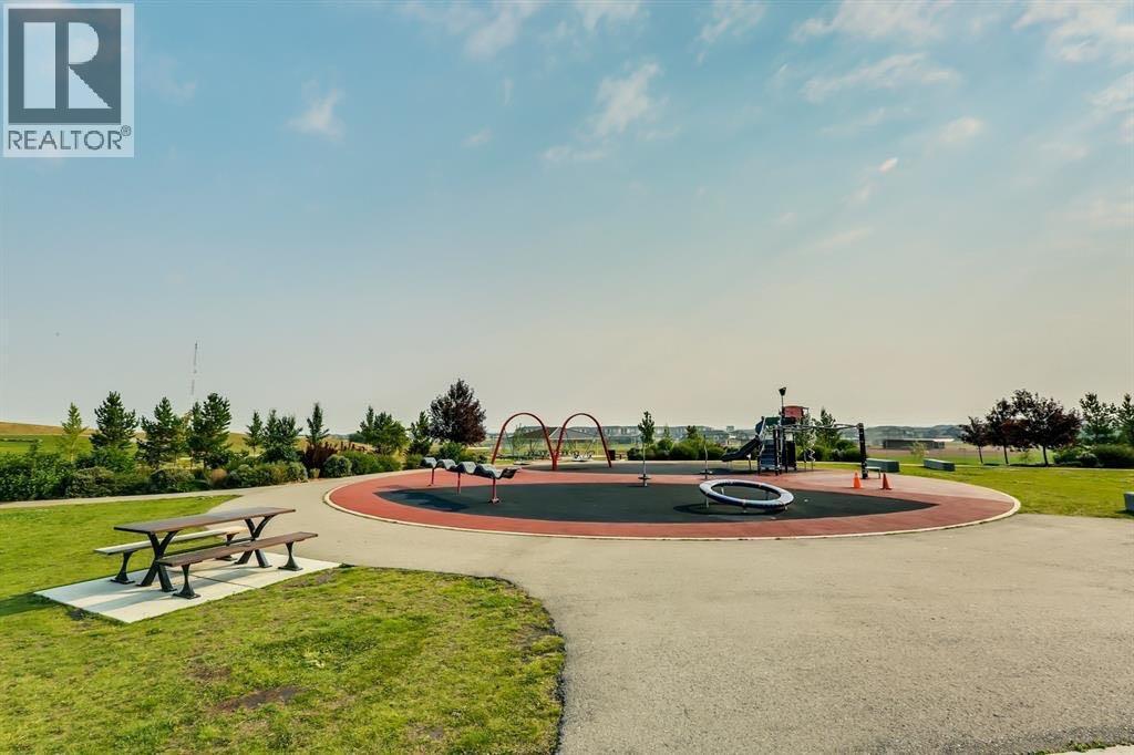 Playground at Chinook Winds Regional Park - 1124 Chinook Gate Bay Sw, Airdrie, AB - Outdoor With View