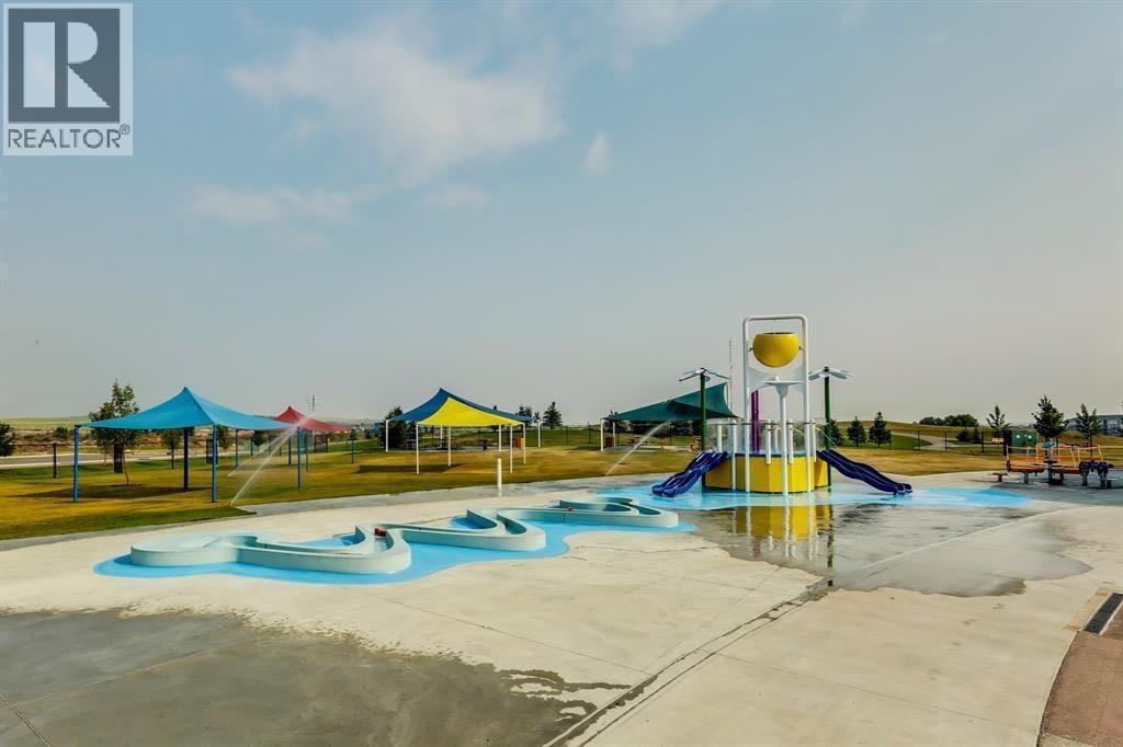 Splash Park at Chinook Winds Regional Park - 1124 Chinook Gate Bay Sw, Airdrie, AB - Outdoor With In Ground Pool