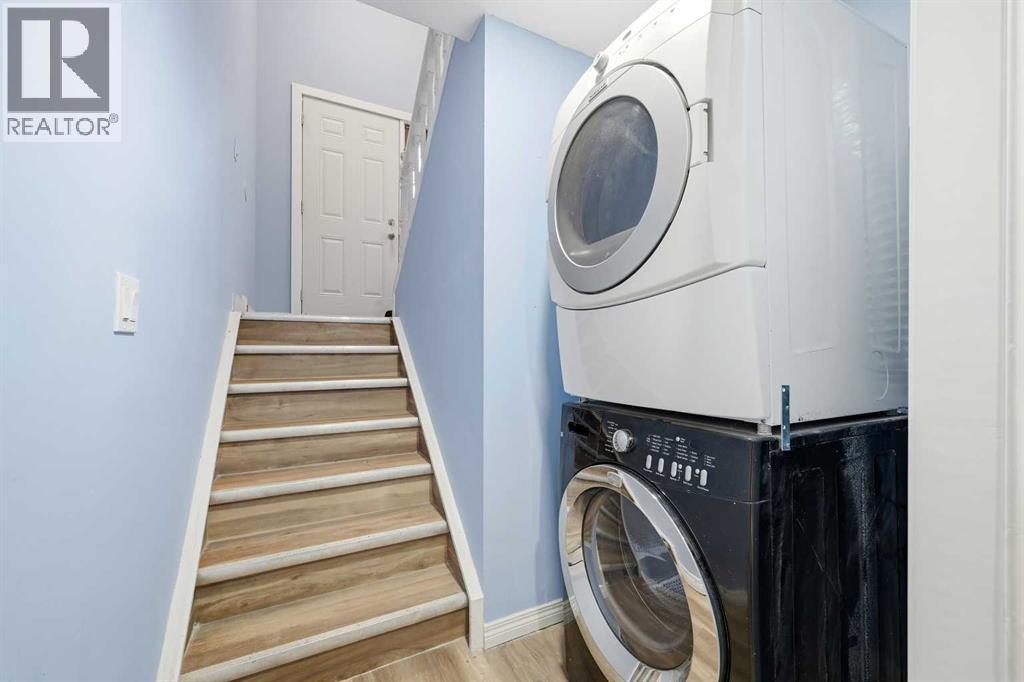 116 Falsby Road Ne, Calgary, AB - Indoor Photo Showing Laundry Room