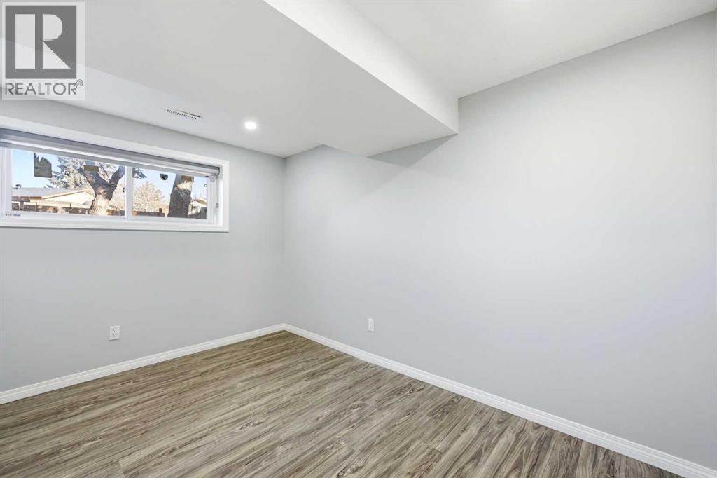 116 Falsby Road Ne, Calgary, AB - Indoor Photo Showing Other Room