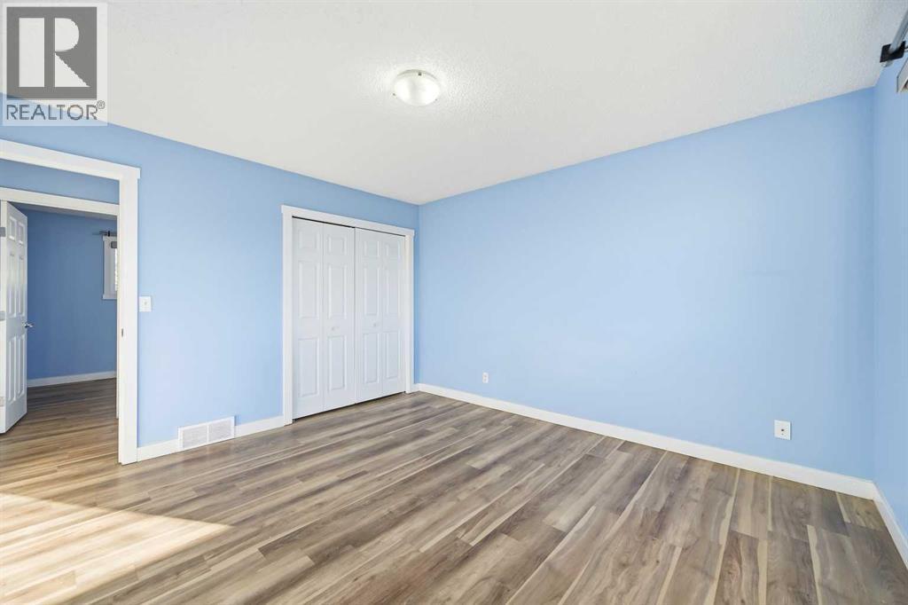 116 Falsby Road Ne, Calgary, AB - Indoor Photo Showing Other Room