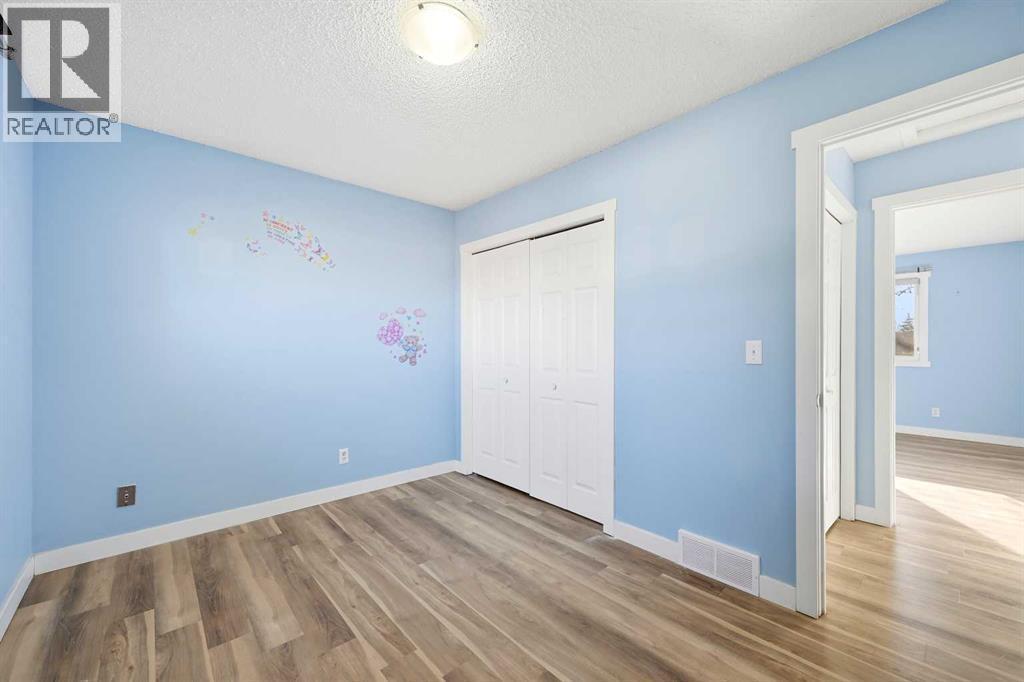 116 Falsby Road Ne, Calgary, AB - Indoor Photo Showing Other Room