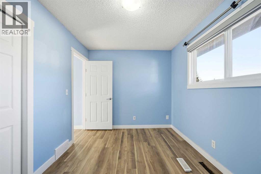 116 Falsby Road Ne, Calgary, AB - Indoor Photo Showing Other Room
