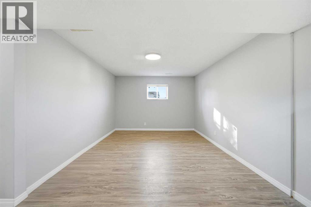 116 Falsby Road Ne, Calgary, AB - Indoor Photo Showing Other Room