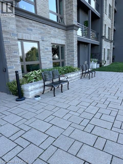 Backyard patio w. L. Ontario views - 35 Southshore Crescent Unit# 303, Stoney Creek, ON - Outdoor With Balcony