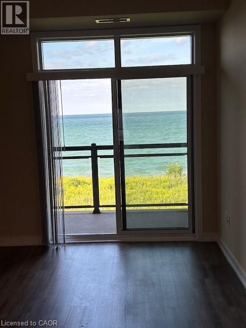 balcony with lake views - 35 Southshore Crescent Unit# 303, Stoney Creek, ON - Indoor Photo Showing Other Room