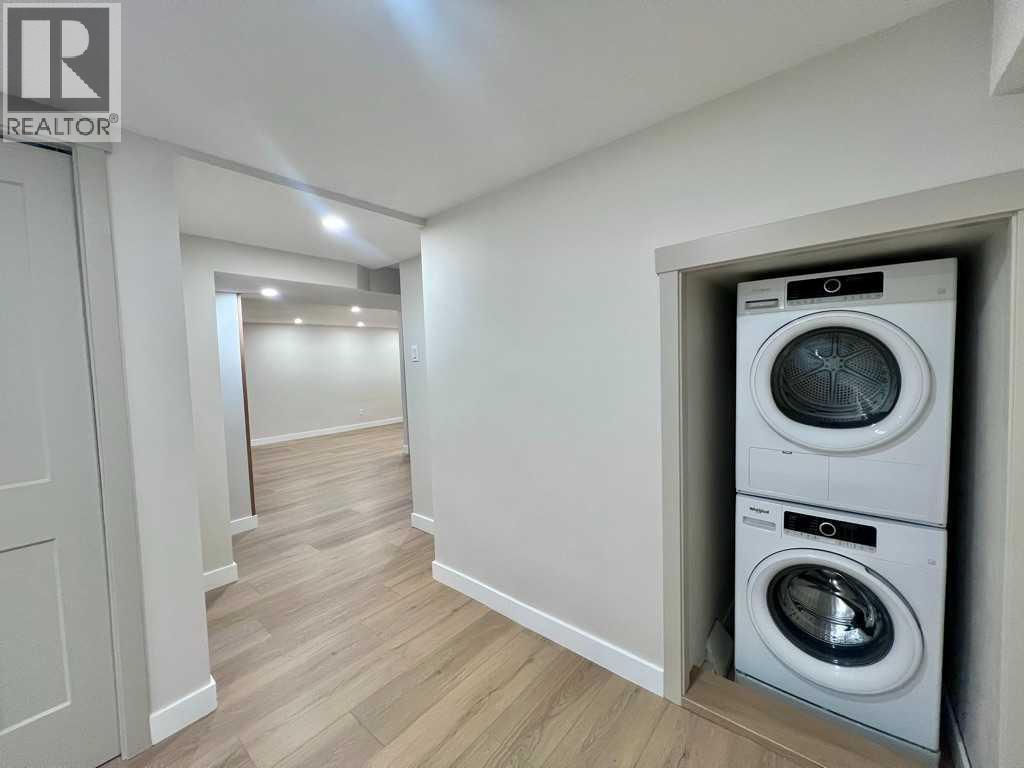 146 Springwood Drive Sw, Calgary, AB - Indoor Photo Showing Laundry Room