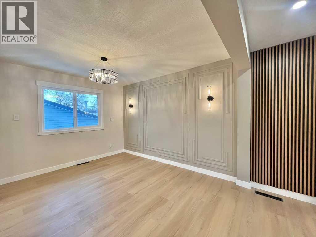 146 Springwood Drive Sw, Calgary, AB - Indoor Photo Showing Other Room