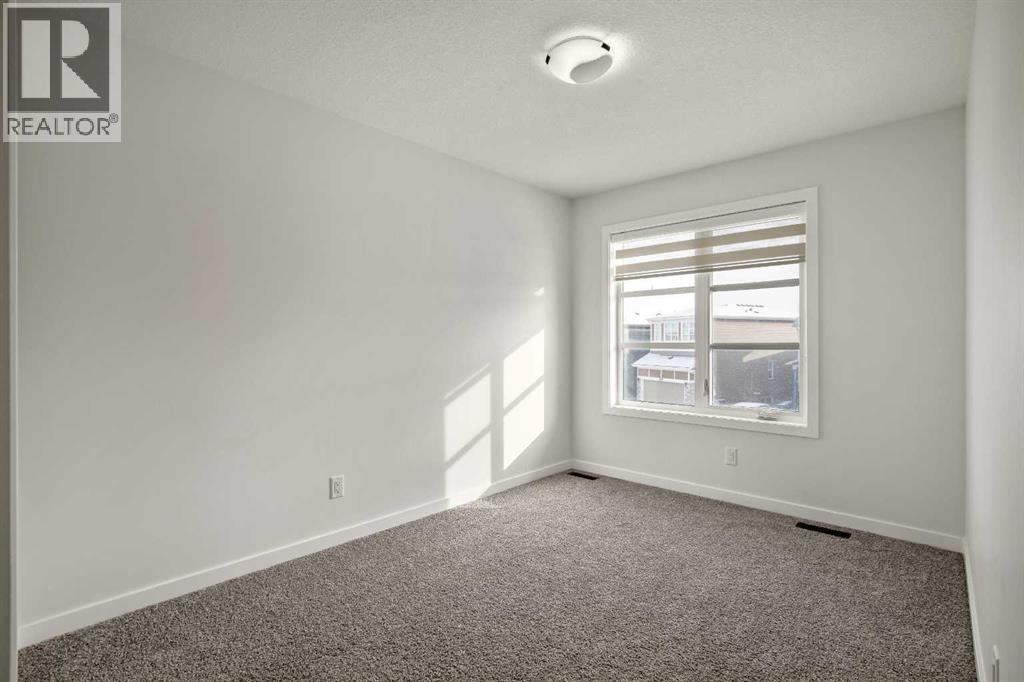 223 Savanna Way Ne, Calgary, AB - Indoor Photo Showing Other Room