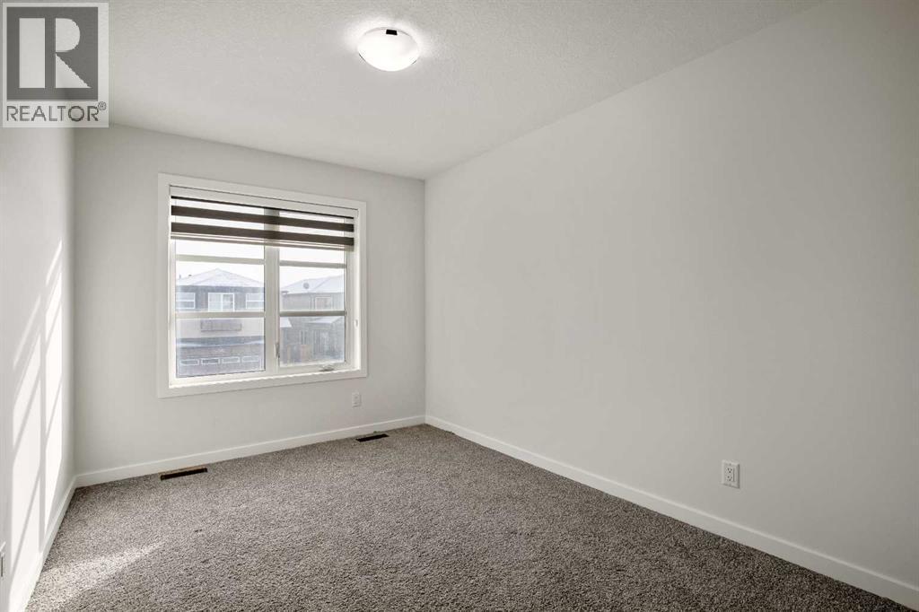 223 Savanna Way Ne, Calgary, AB - Indoor Photo Showing Other Room