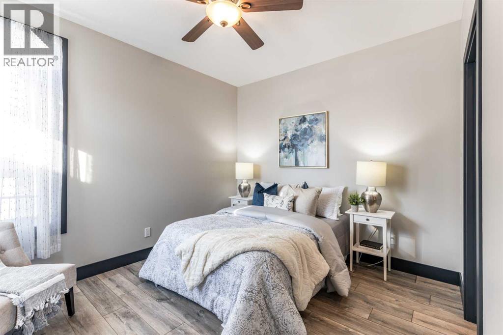 22 Palisades Lane Ne, Medicine Hat, AB - Indoor Photo Showing Bedroom