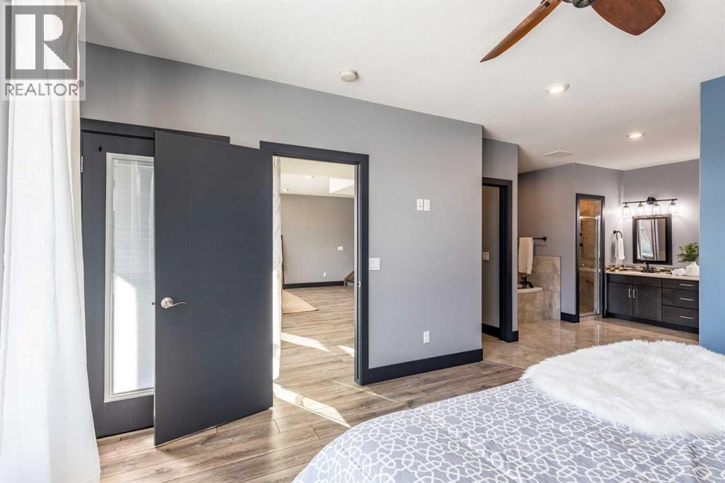 22 Palisades Lane Ne, Medicine Hat, AB - Indoor Photo Showing Bedroom