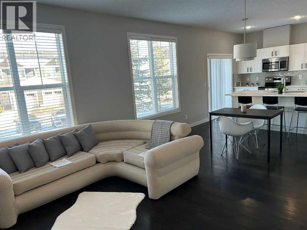 1101, 881 Sage Valley Boulevard Nw, Calgary, AB - Indoor Photo Showing Living Room