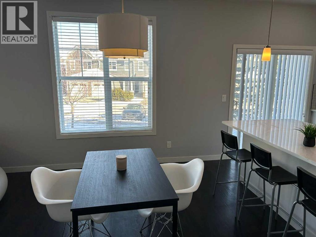 1101, 881 Sage Valley Boulevard Nw, Calgary, AB - Indoor Photo Showing Dining Room