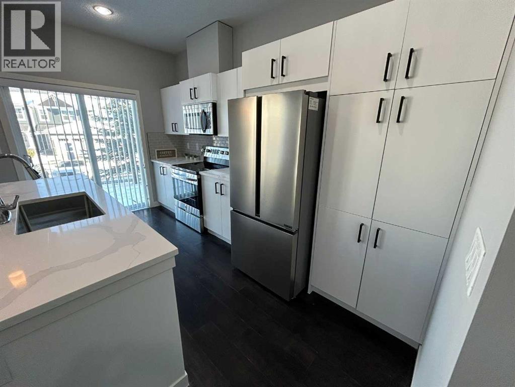 1101, 881 Sage Valley Boulevard Nw, Calgary, AB - Indoor Photo Showing Kitchen