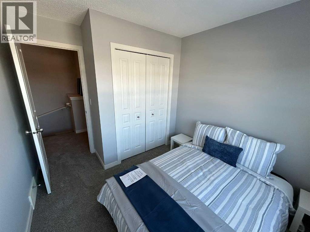 1101, 881 Sage Valley Boulevard Nw, Calgary, AB - Indoor Photo Showing Bedroom