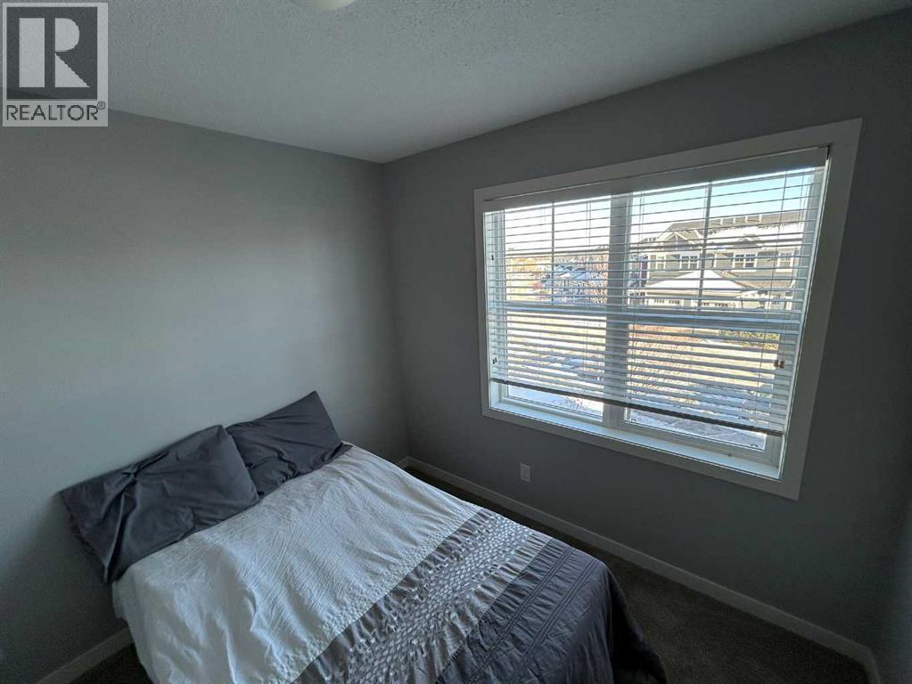 1101, 881 Sage Valley Boulevard Nw, Calgary, AB - Indoor Photo Showing Bedroom