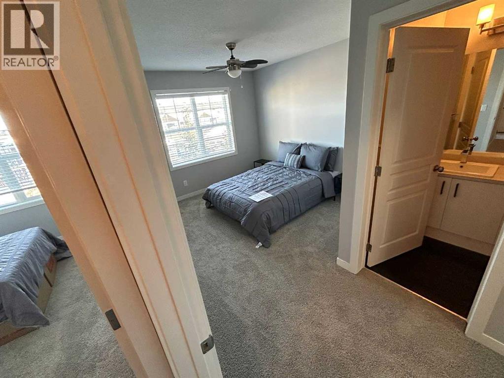 1101, 881 Sage Valley Boulevard Nw, Calgary, AB - Indoor Photo Showing Bedroom