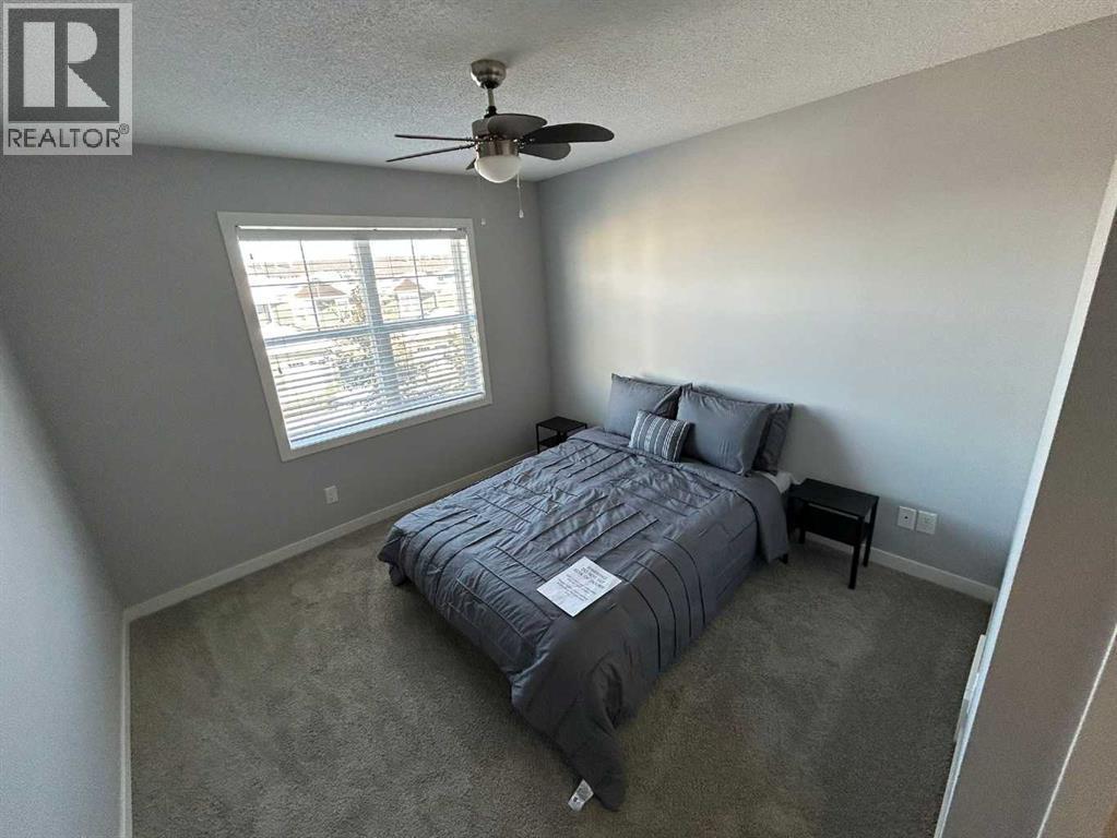 1101, 881 Sage Valley Boulevard Nw, Calgary, AB - Indoor Photo Showing Bedroom