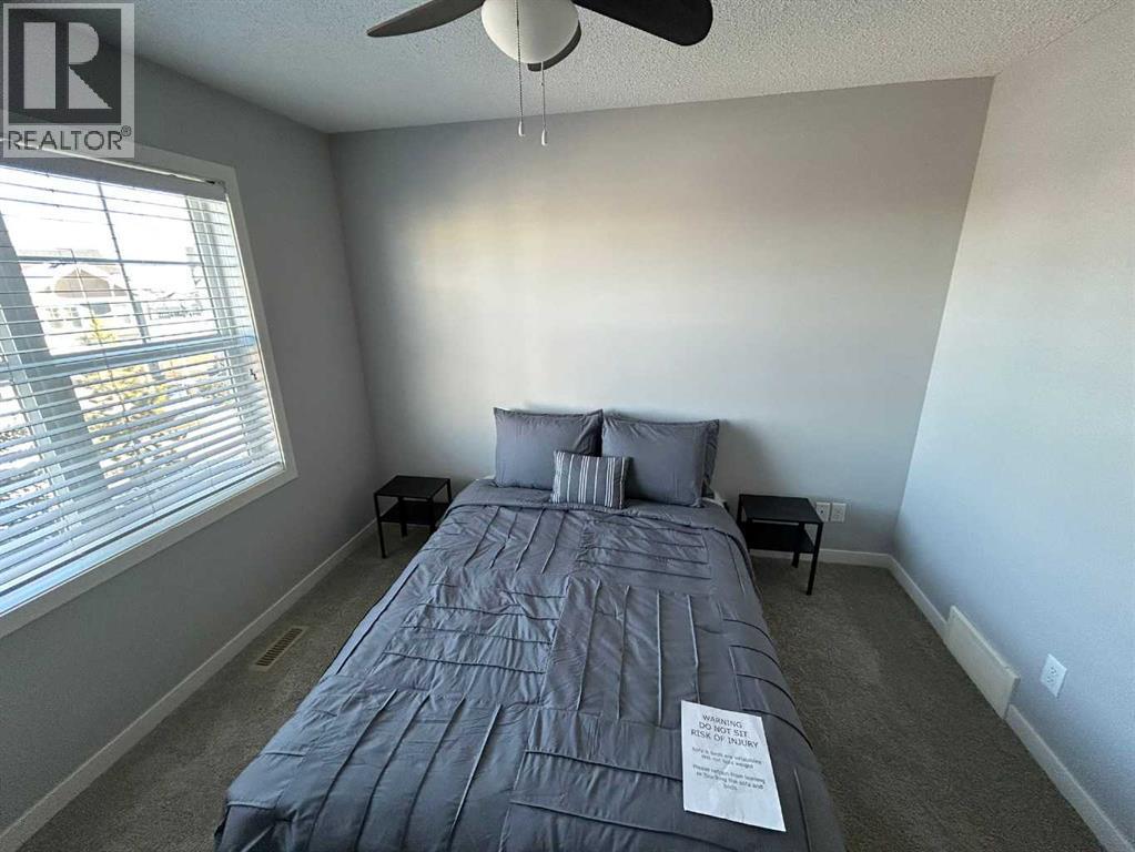1101, 881 Sage Valley Boulevard Nw, Calgary, AB - Indoor Photo Showing Bedroom