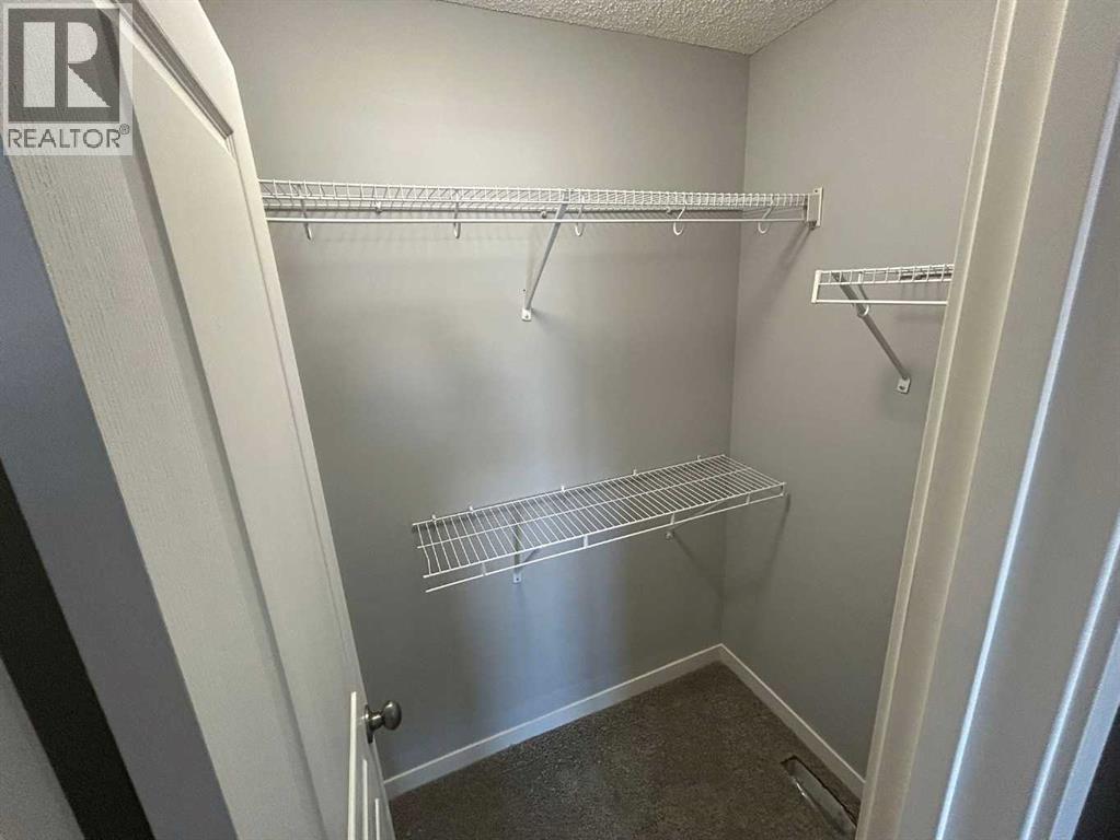 1101, 881 Sage Valley Boulevard Nw, Calgary, AB - Indoor With Storage