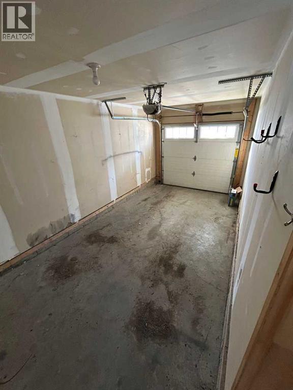 1101, 881 Sage Valley Boulevard Nw, Calgary, AB - Indoor Photo Showing Garage