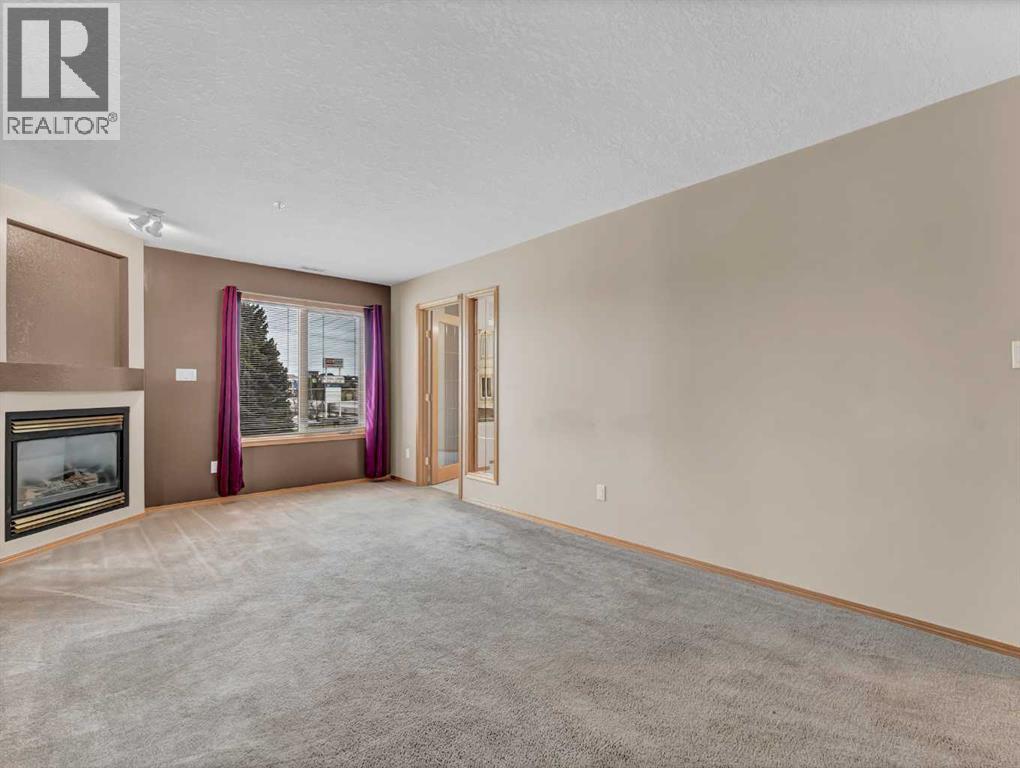 208, 1182 Southview Drive Se, Medicine Hat, AB - Indoor With Fireplace