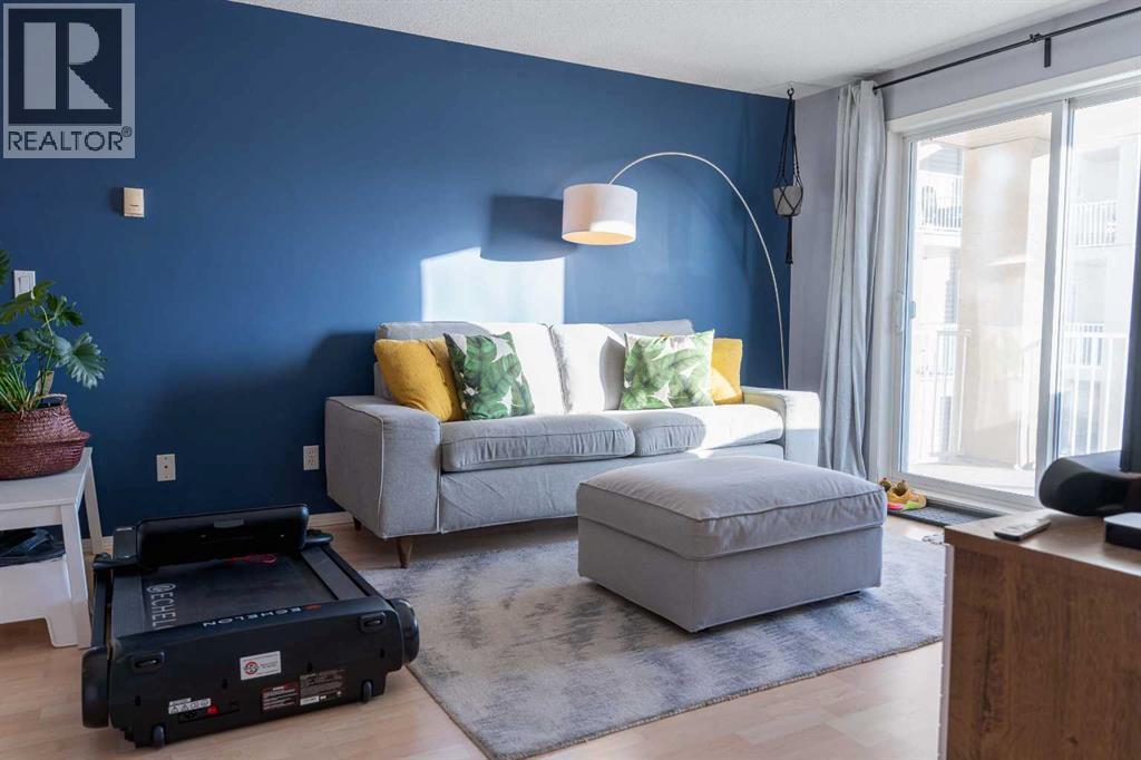 Bright living room - 206, 2000 Citadel Meadow Point Nw, Calgary, AB - Indoor