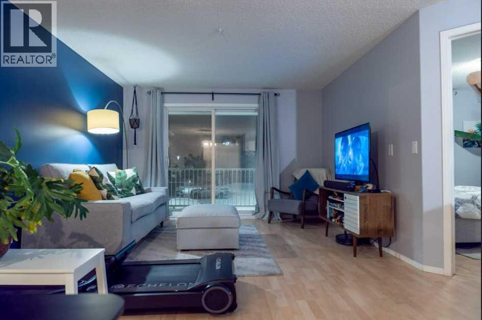 206, 2000 Citadel Meadow Point Nw, Calgary, AB - Indoor Photo Showing Living Room